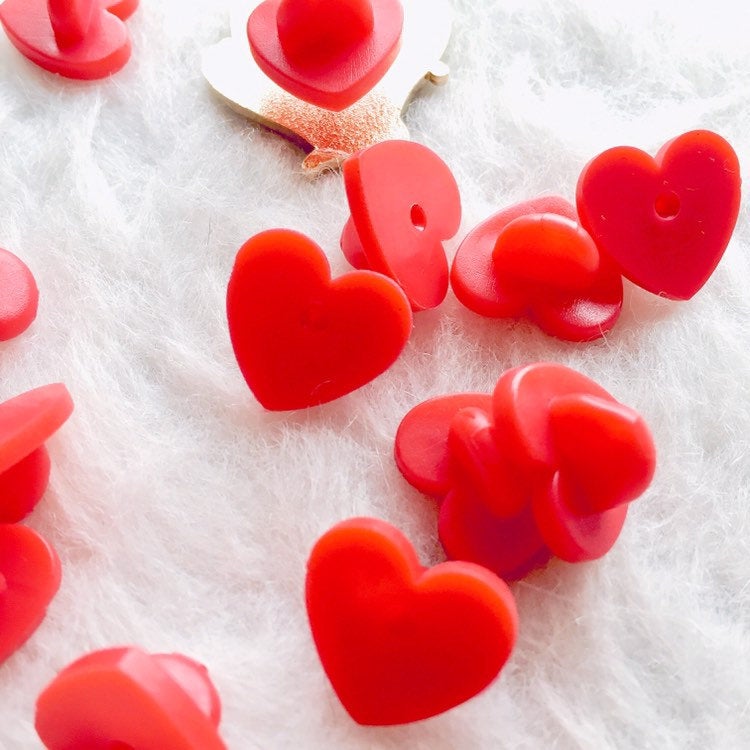 Heart-shaped pin's backs